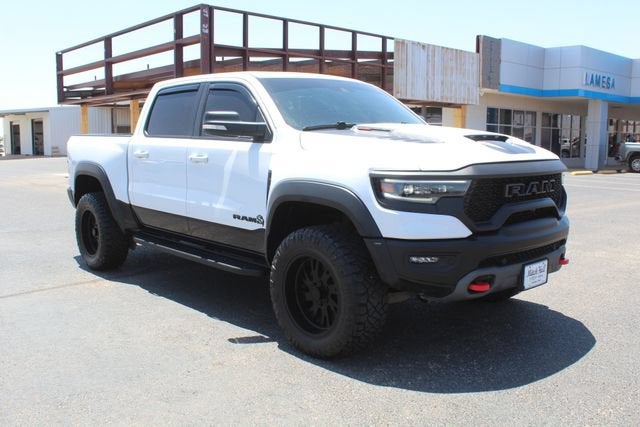 2022 RAM 1500 TRX in Bright White Clea — front three-quarter view