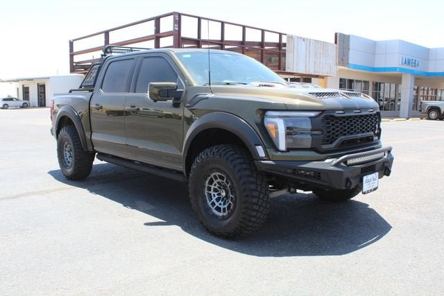 2024 Ford F-150 Raptor in Green — front three-quarter view