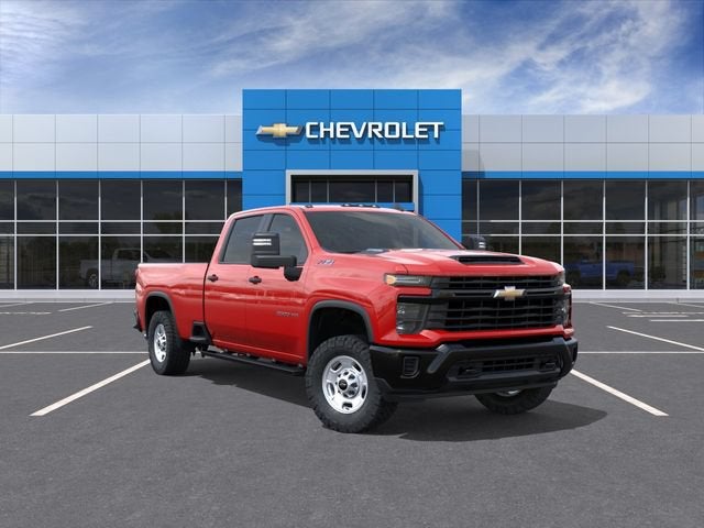 2026 Chevrolet Silverado 2500 HD WT in Red Hot — front three-quarter view